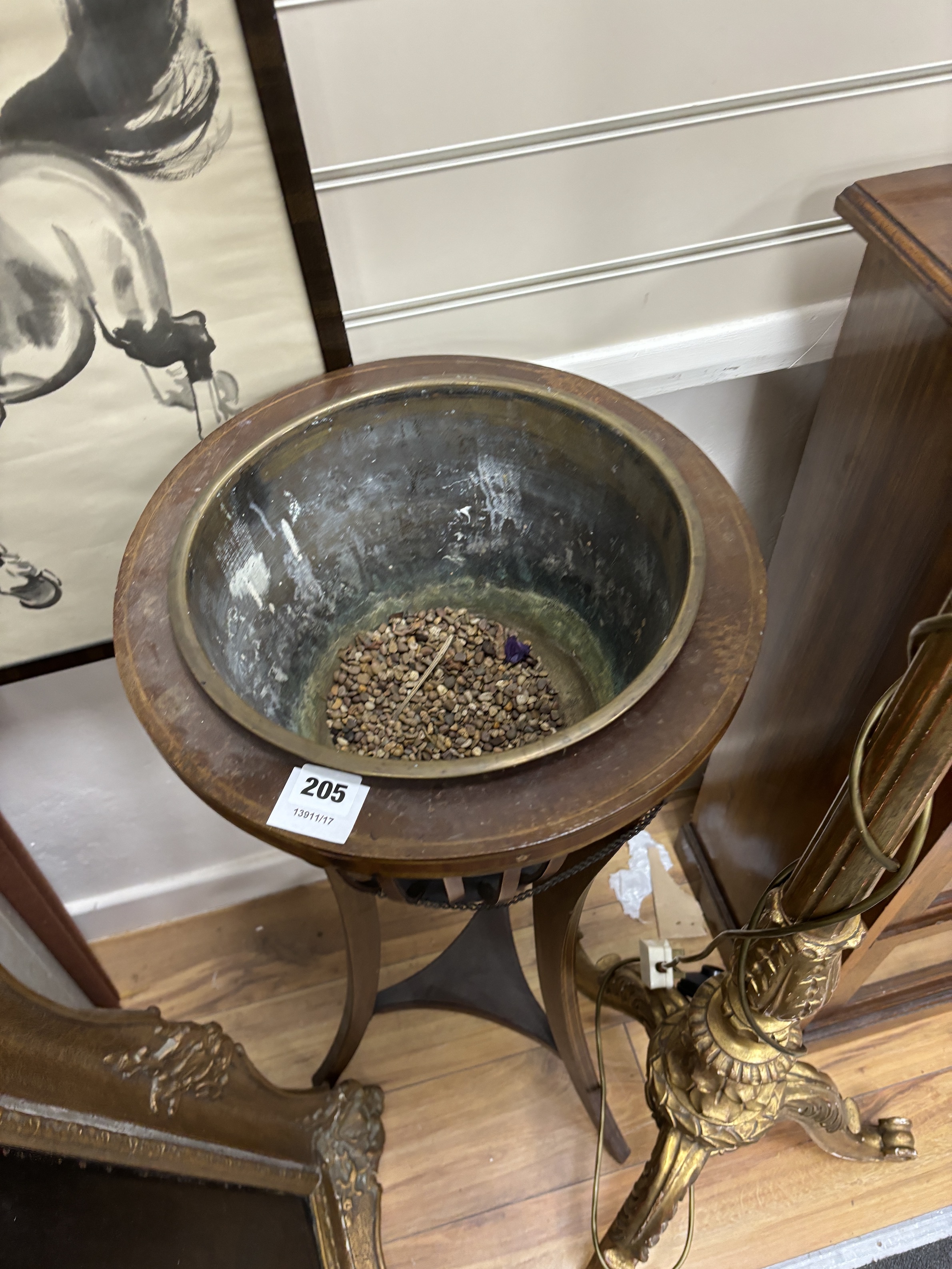 An Edwardian inlaid mahogany jardiniere with brass liner, diameter 37cm, height 93cm
